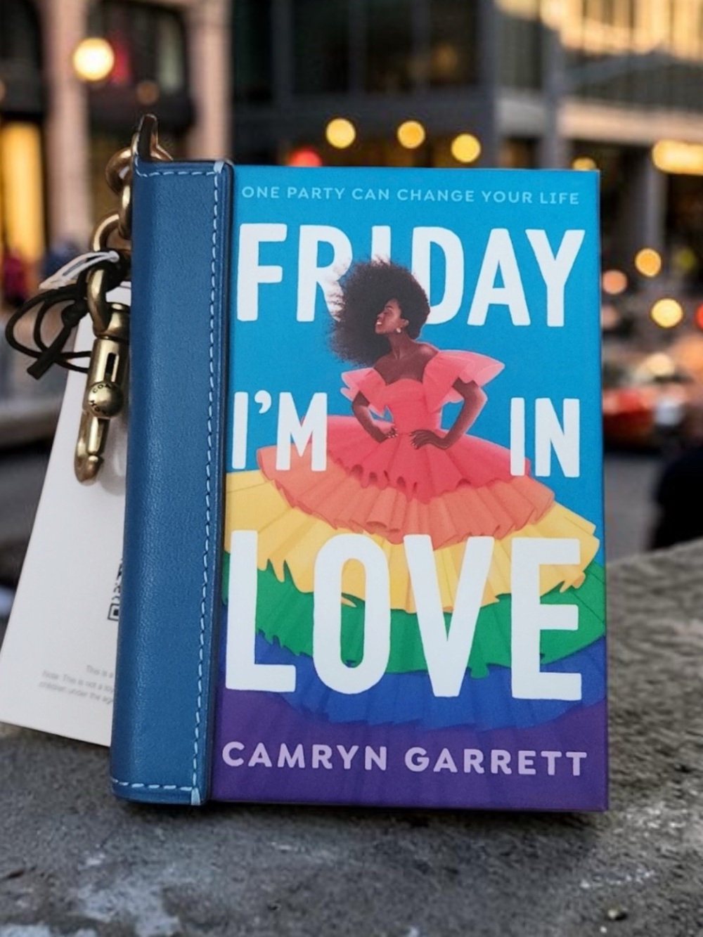 Coach storybook bag charm Friday I’m in love Camryn Garrett book charm pride
